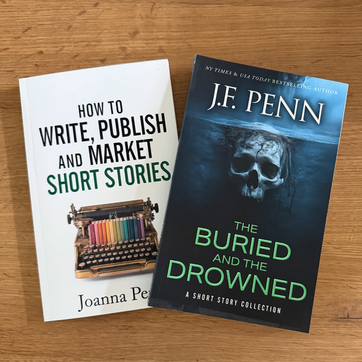 How to Write, Publish and Market Short Stories by Joanna Penn and The Buried and the Drowned by J.F. Penn paperbacks on a wooden table