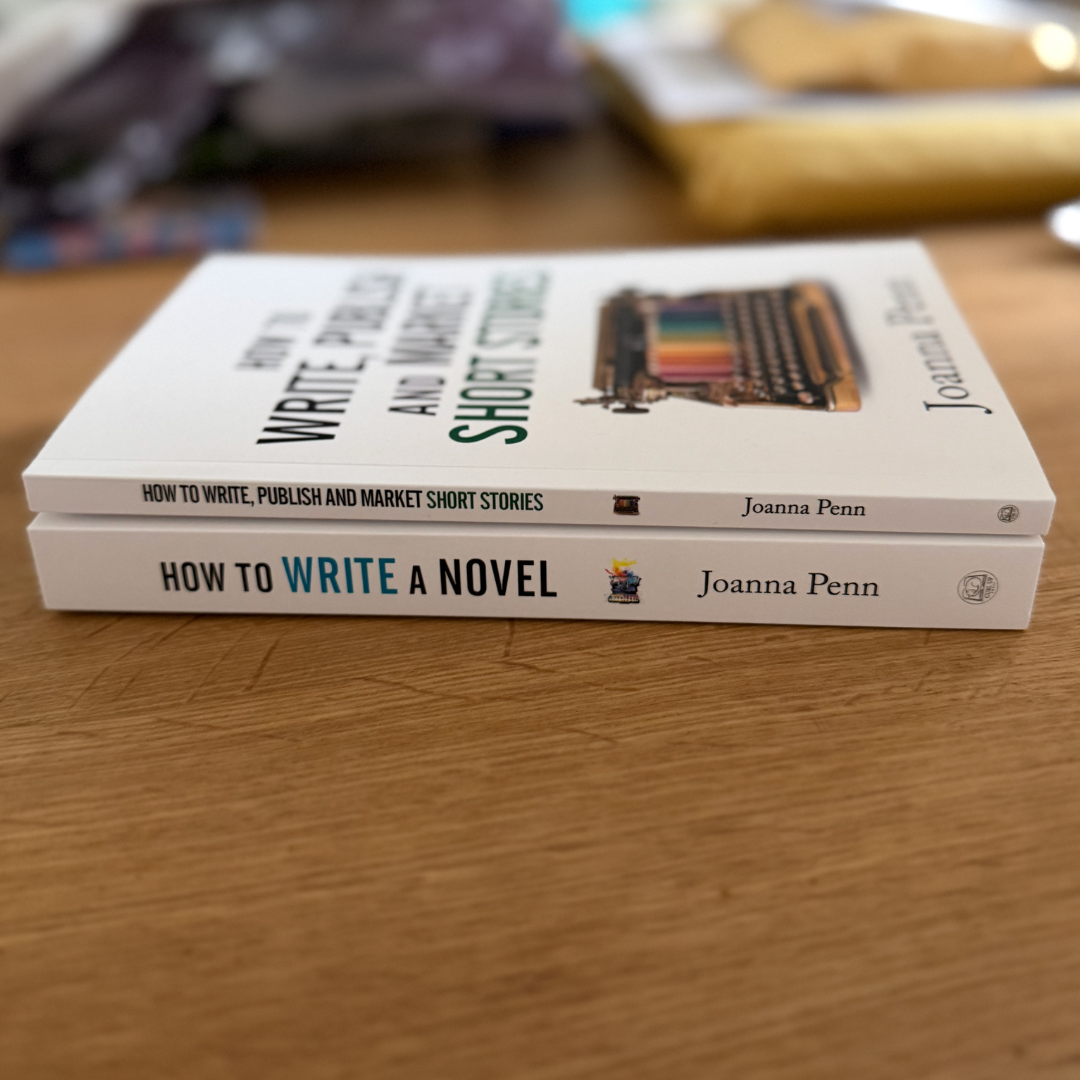 Stacked spines of the How to Write a Novel and How to Write, Publish, and Market Short Stories paperbacks by Joanna Penn